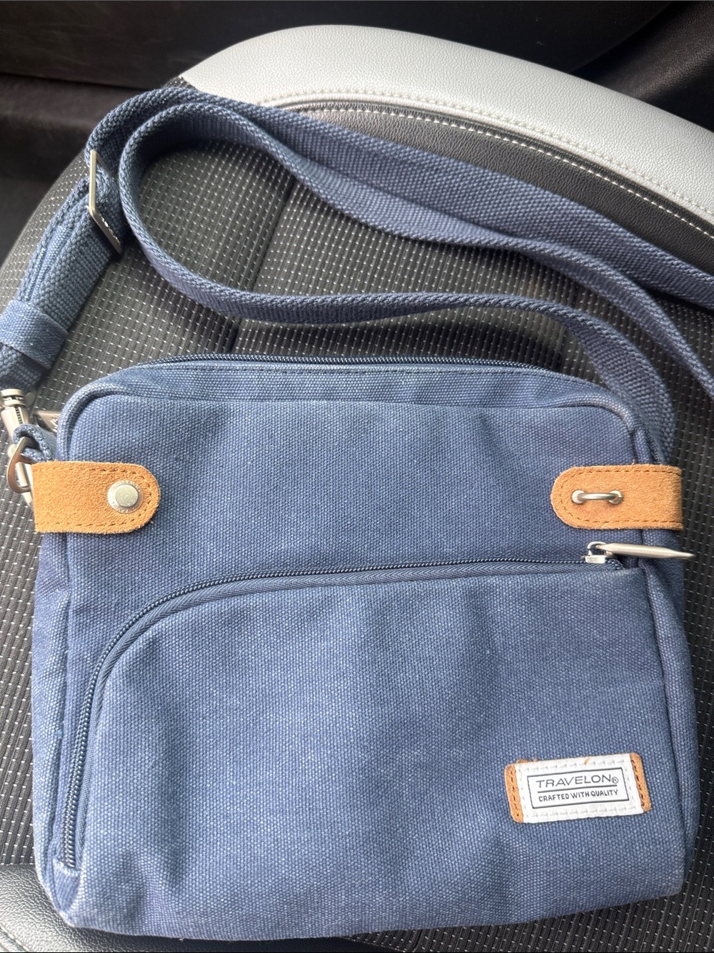 Travelon Navy Blue Canvas Messenger Bag with Tan Accents